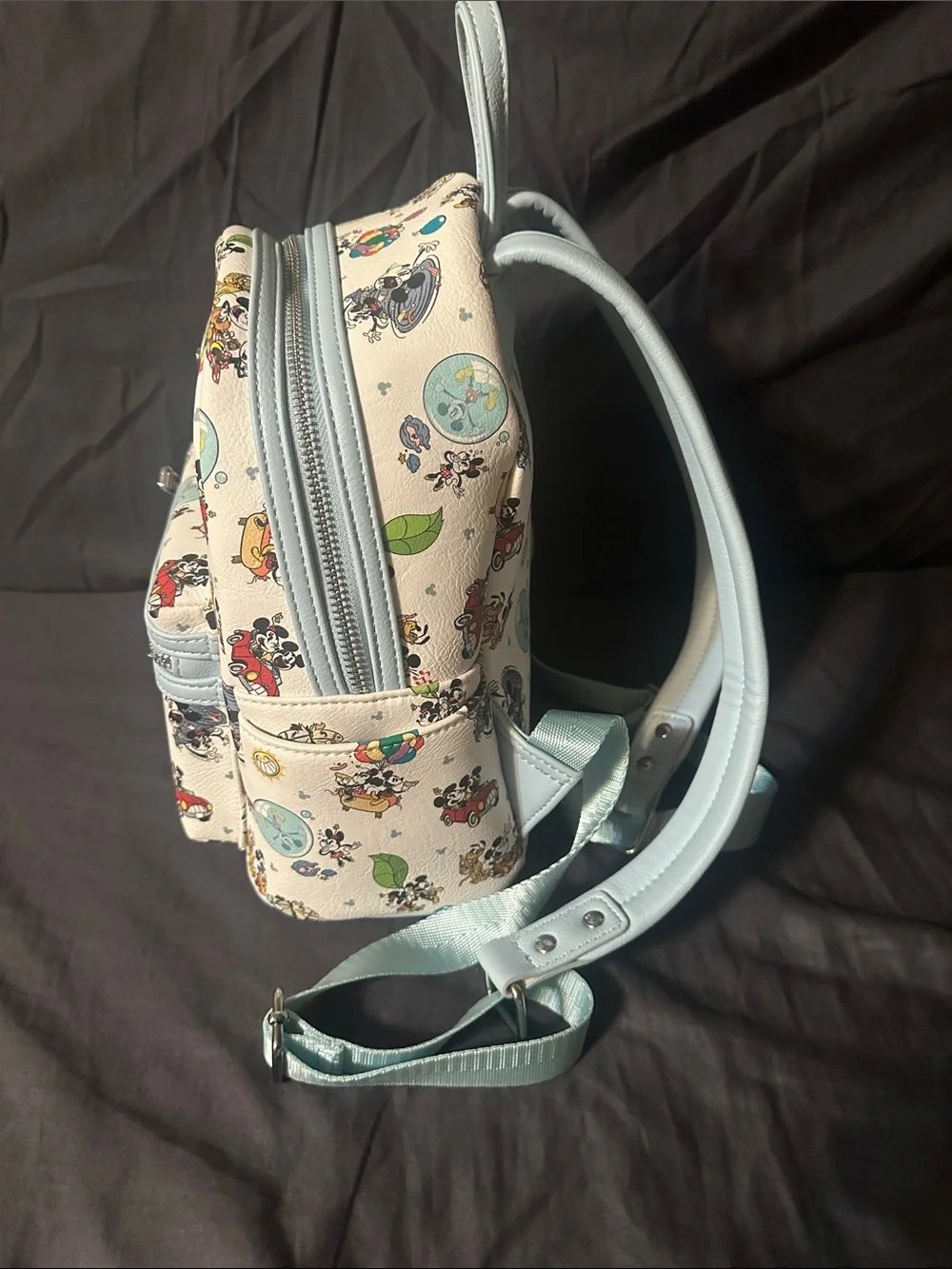 Loungefly Kids Cream Mini Backpack with Light Blue Trim and Disney Print.